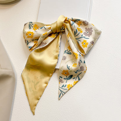 Model wearing yellow scarf in spring