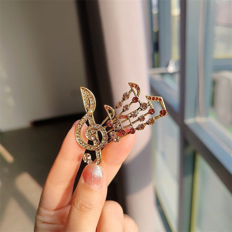 musical note brooch blue color rhinestones
