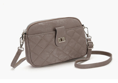 Lifestyle image of woman with phone bag image 10