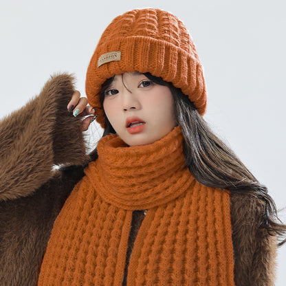 Elegant white knit hat with scarf