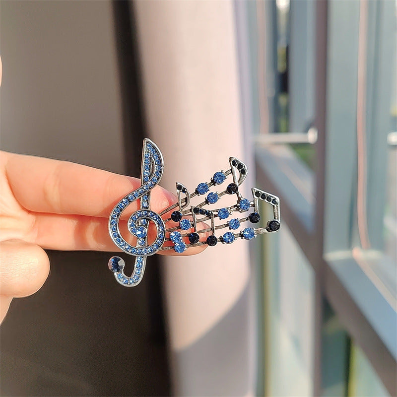 musical note brooch brown color rhinestones