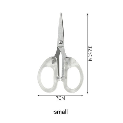 Hands using scissors for craft projects