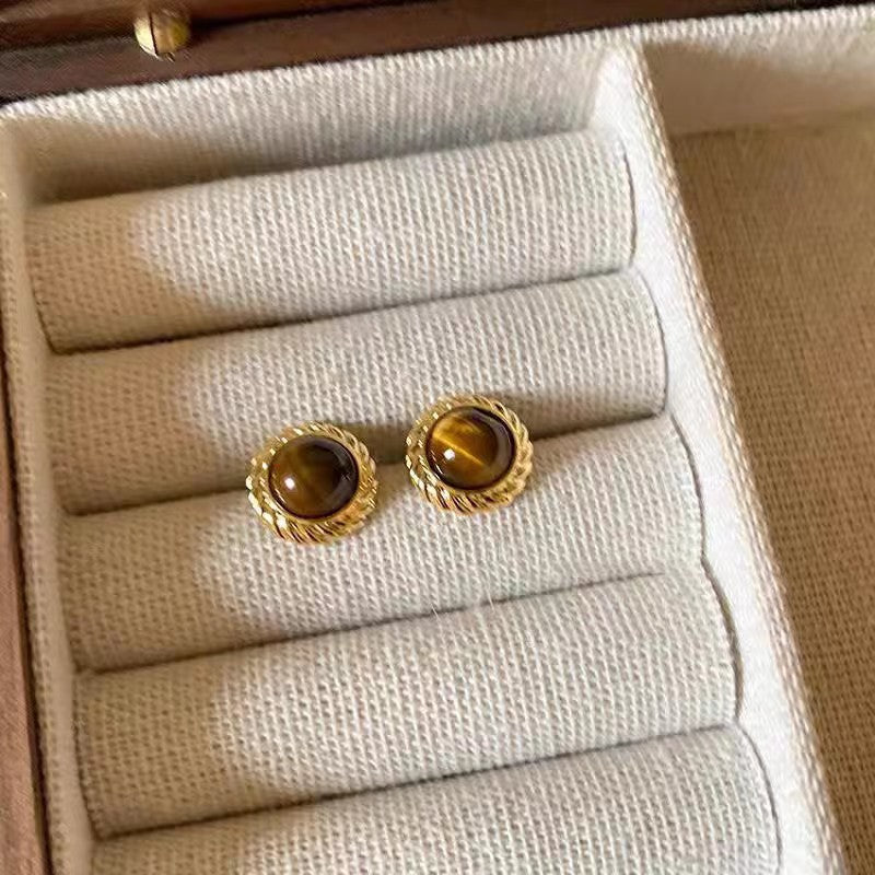 Elegant metal earrings with round design